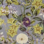 Terciopelo de estampado floral en lila "Passiflora" diseño de Clarke & Clarke